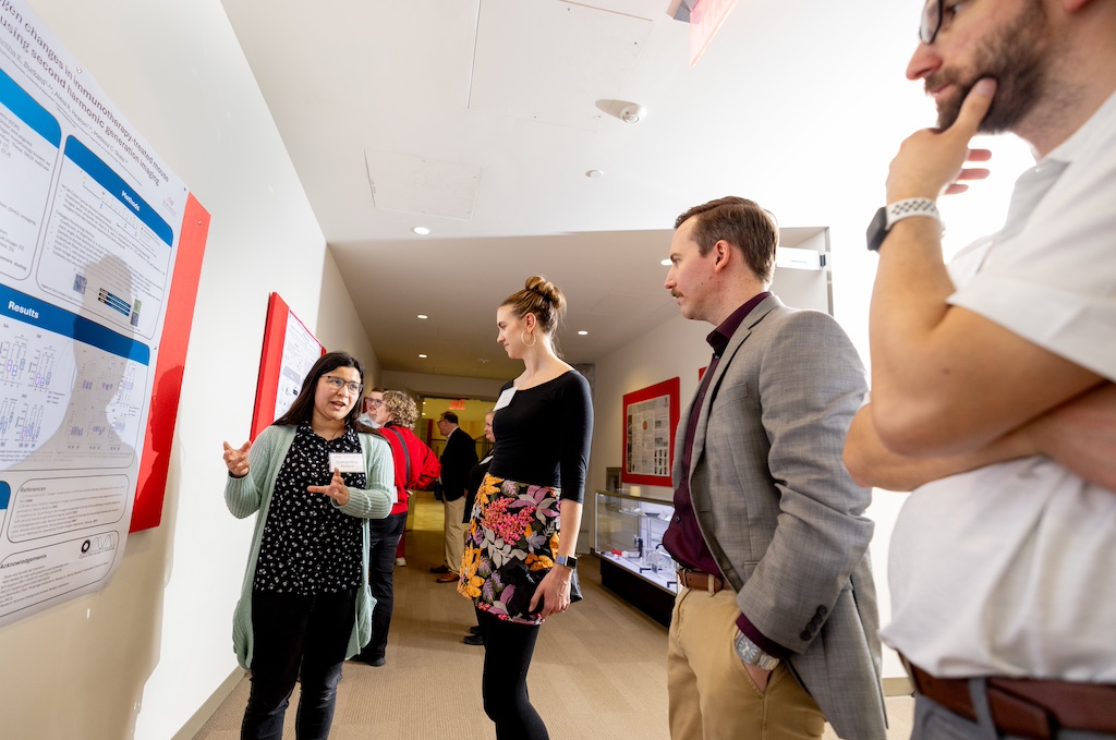 Members of the Skala Lab share poster presentations highlighting their research, demonstrating various applications of biomedical imaging to enrich patient care and improve health.